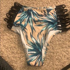 High waisted bathing suit bottom .